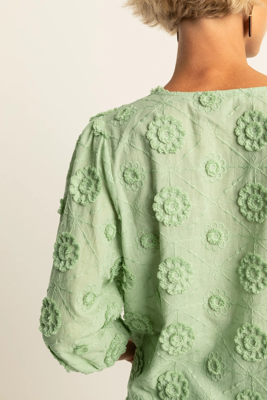 Blouse met bloemapplicaties