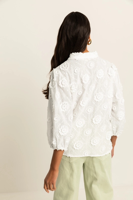Blouse met bloemapplicaties