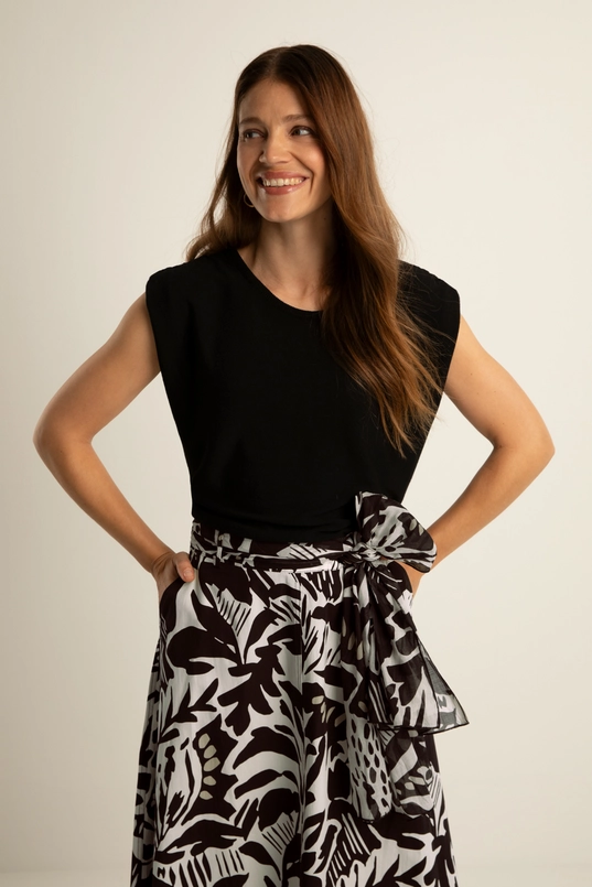 Gebreide spencer met ruchedetails