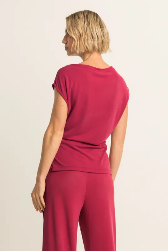 Gedrapeerde top met strikdetail