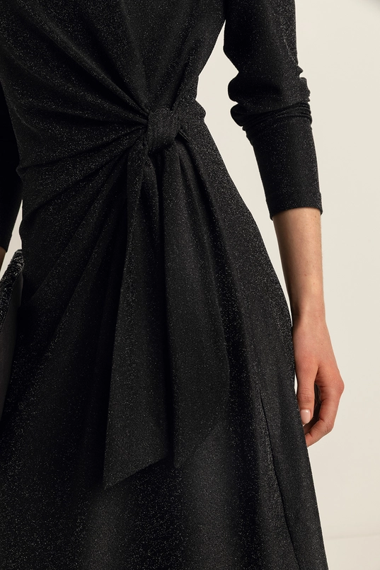 Glitterjurk met knoopdetail