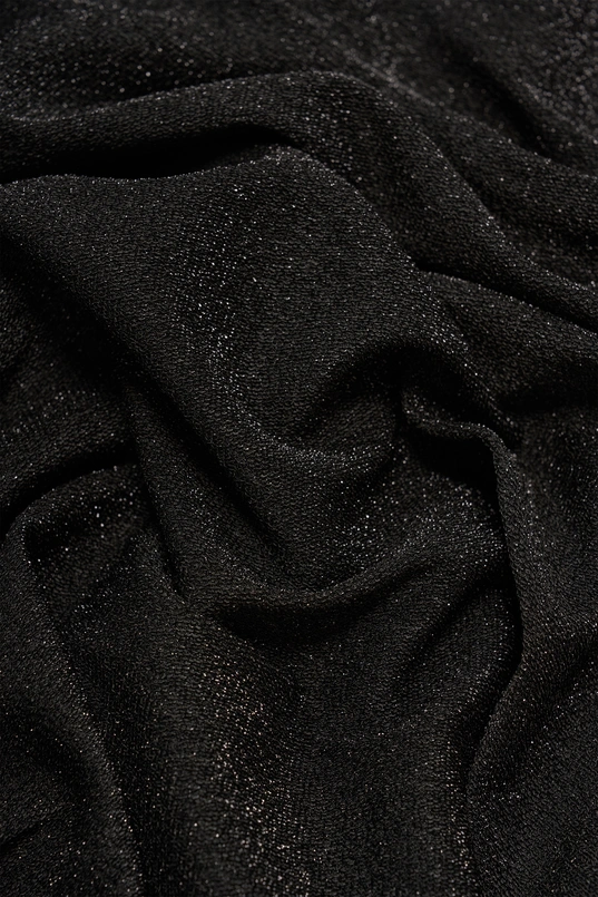 Glitterjurk met knoopdetail