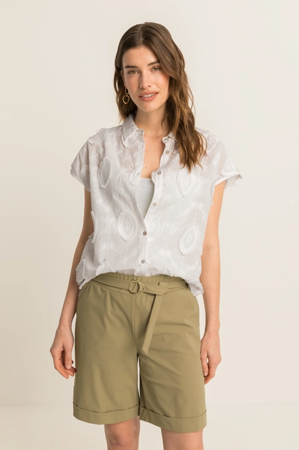 Mouwloze blouse met geborduurde details