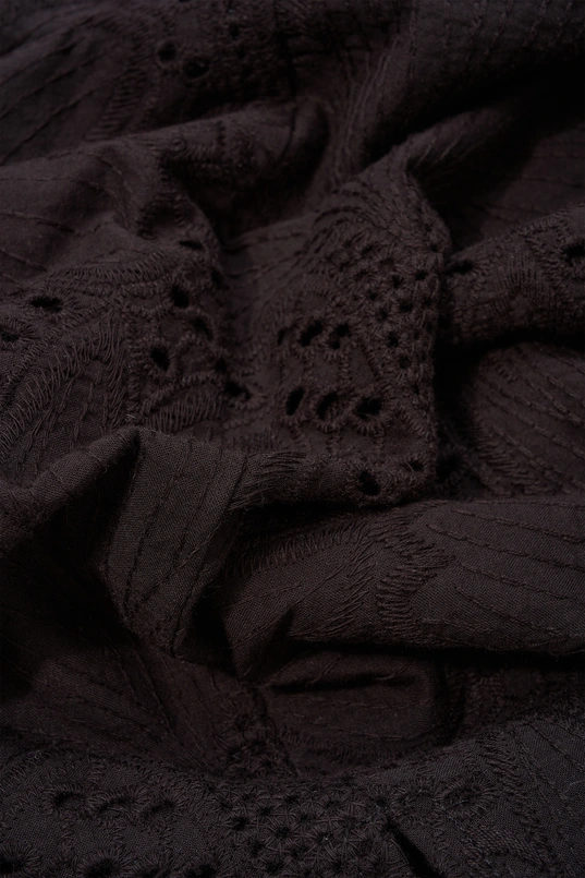 Mouwloze broderie blouse