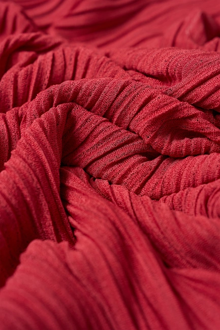 Soepelvallende plissé jurk