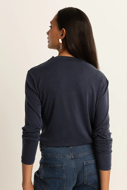 Top met schouderplooien