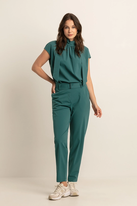 Travel top met strikdetail