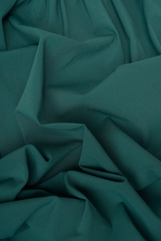 Travel top met strikdetail