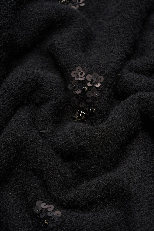 Trui met geborduurde details