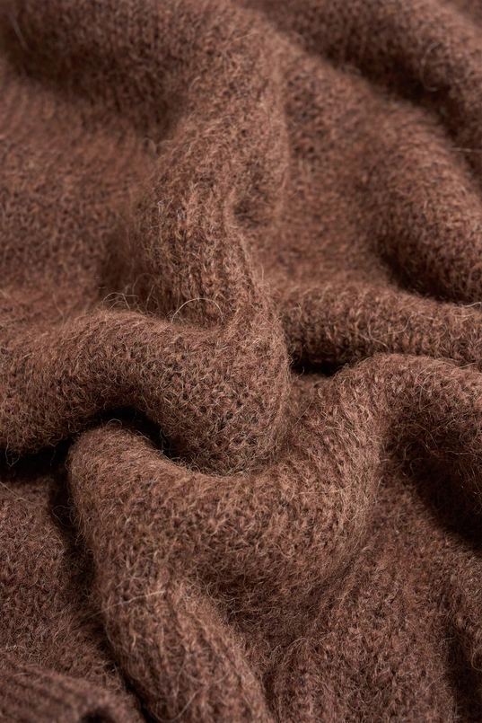 Trui met strikdetail