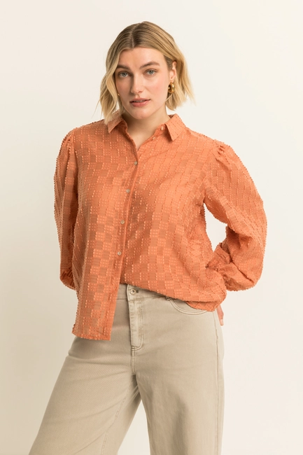 Volumineuze blouse met structuur