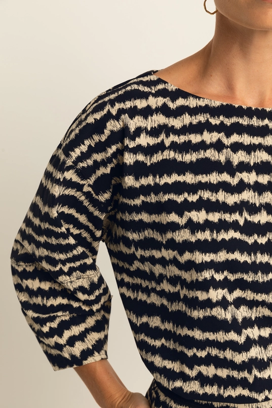 Volumineuze traveltop