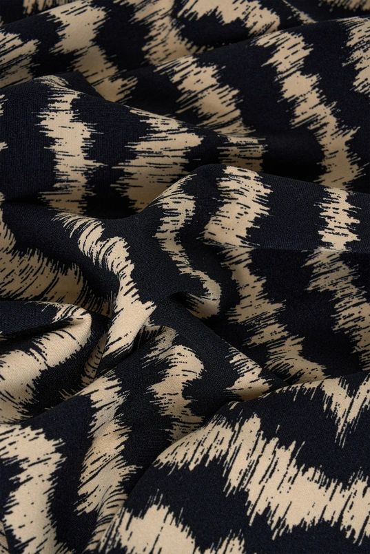 Volumineuze traveltop