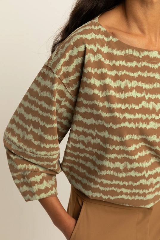 Volumineuze traveltop