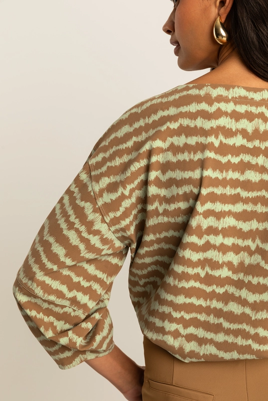 Volumineuze traveltop